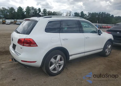 2014 Volkswagen Touareg V6 z USA, uszkodzony, nr VIN WVGEF9BP6ED011096